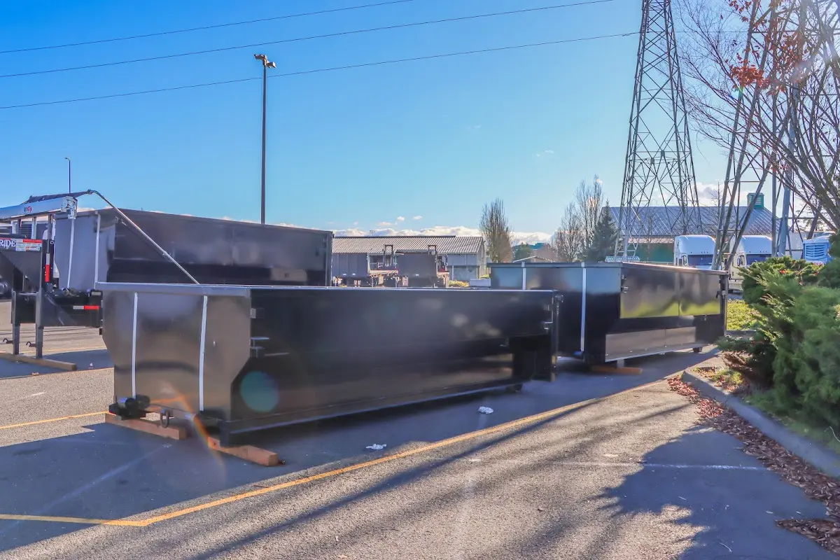Roll-off dumpster ready for waste disposal at job site for Yard Waste Dumpster Rental in St. Helens